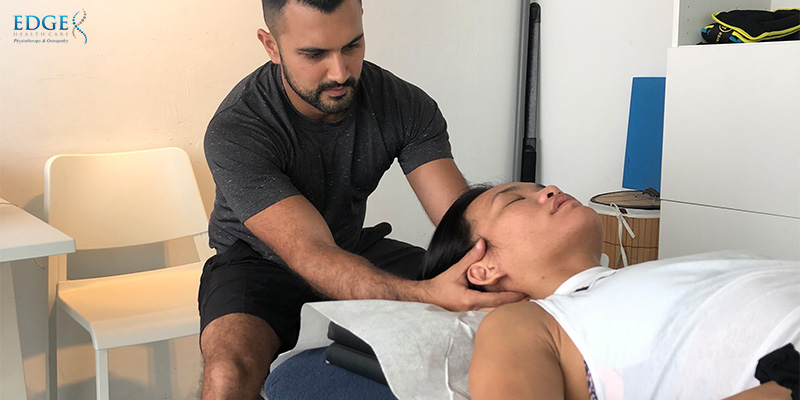 osteopath treating a patient