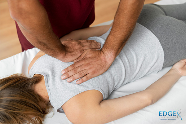 osteopath treating a patient