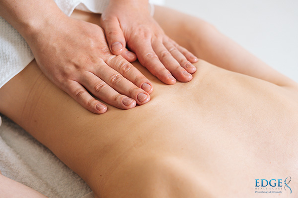 woman getting treatment in osteopathy singapore