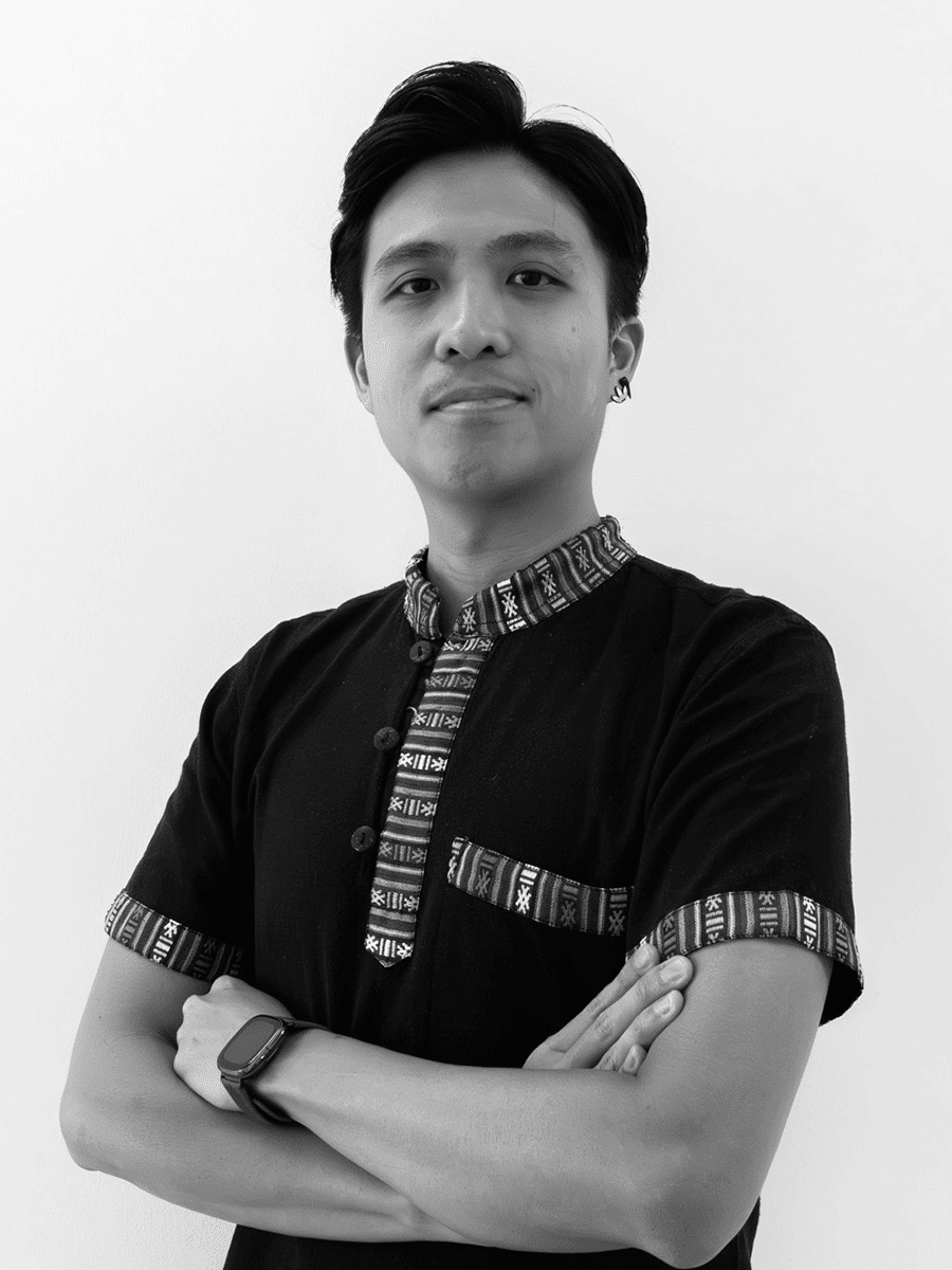 a person with crossed arms black-and-white photo